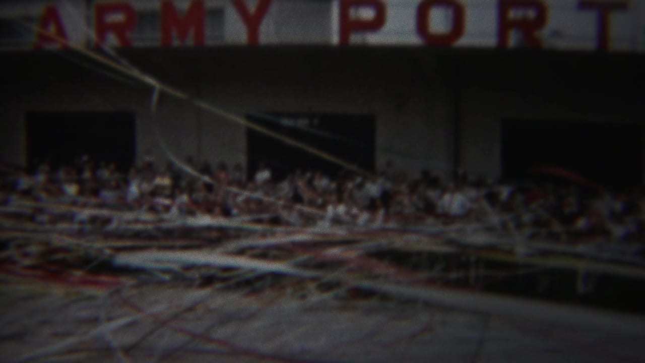 Yokohama port crowd appears along balconies and railings beneath large ARMY PORT lettering in 1954 footage.