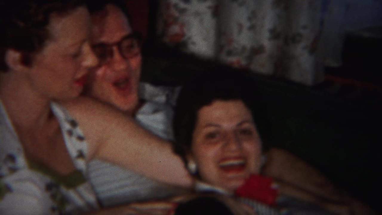 In Westville, New Jersey home-movie footage from 1951, three adults sit close together on a couch and laugh.