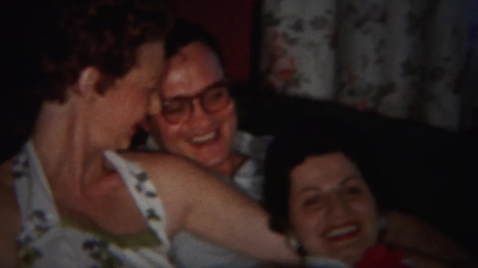 The closing frame keeps the three adults laughing together on a couch in the metadata-supported 1951 Westville setting.