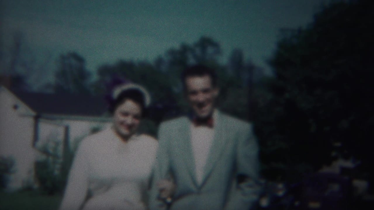 Newlywed couple in 1951 Westville, New Jersey, walks toward the camera in soft color 8mm footage.