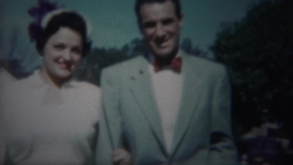 The newlywed couple fills the frame in soft-focus 1951 Westville, New Jersey home-movie footage.