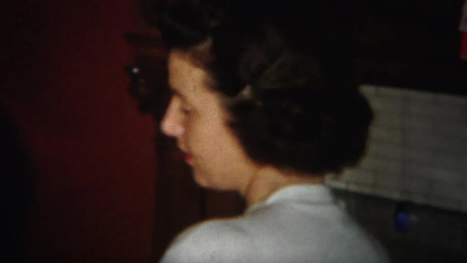 Two adult women appear in a 1951 Westville interior, one in dark clothing and one with dark styled hair and a light top.