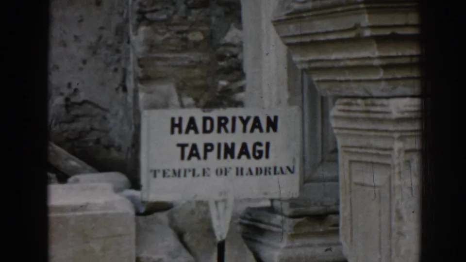1962 Ephesus travel frame with the Temple of Hadrian sign near carved stone trim, masonry, and dark 8mm frame borders.