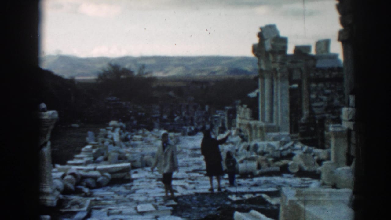 The final frame shows visitors at Ephesus in 1962, with tall columns, fallen stone, and hills beyond the ruins.