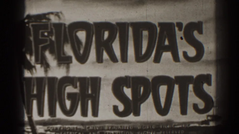 Black-and-white 8mm frame of the Florida's High Spots title card, showing bold travel-reel typography, grain, scratches, and dark gate edges.