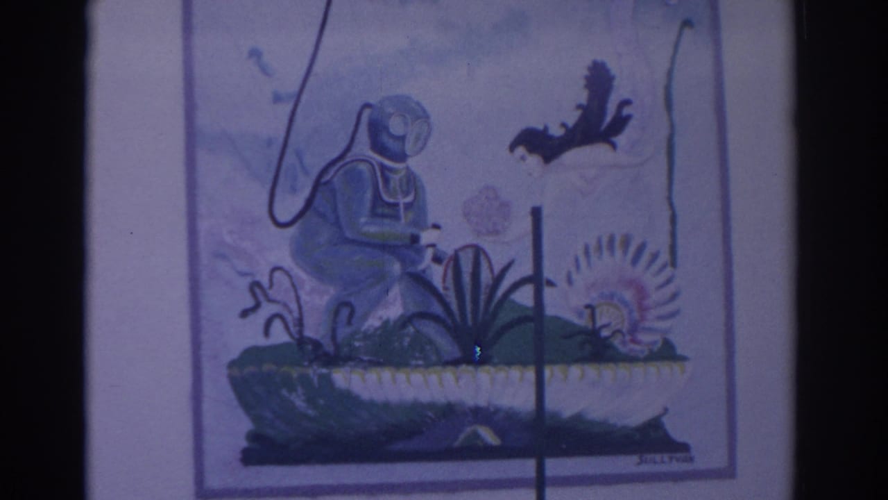 Framed painting of a vintage diving-suit figure among sea plants and fish.