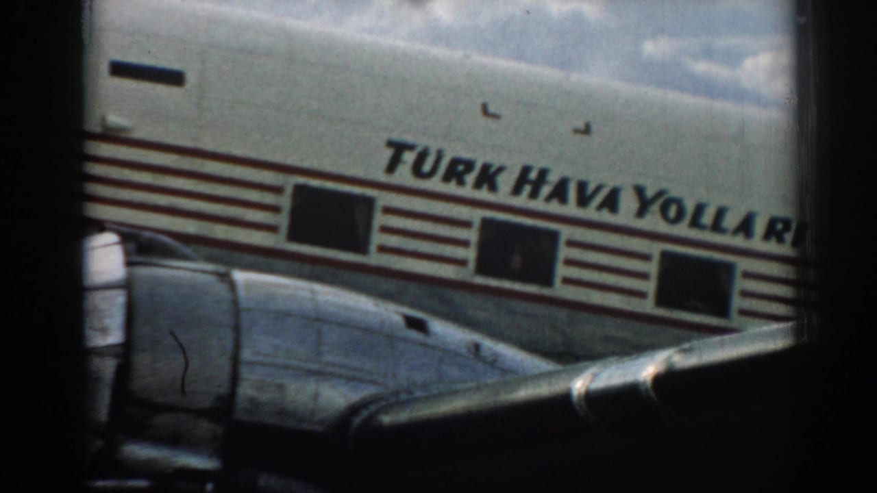 The final frame holds on the marked Turkish Airlines fuselage, wing surface, and engine area, partially blocked by the window framing.