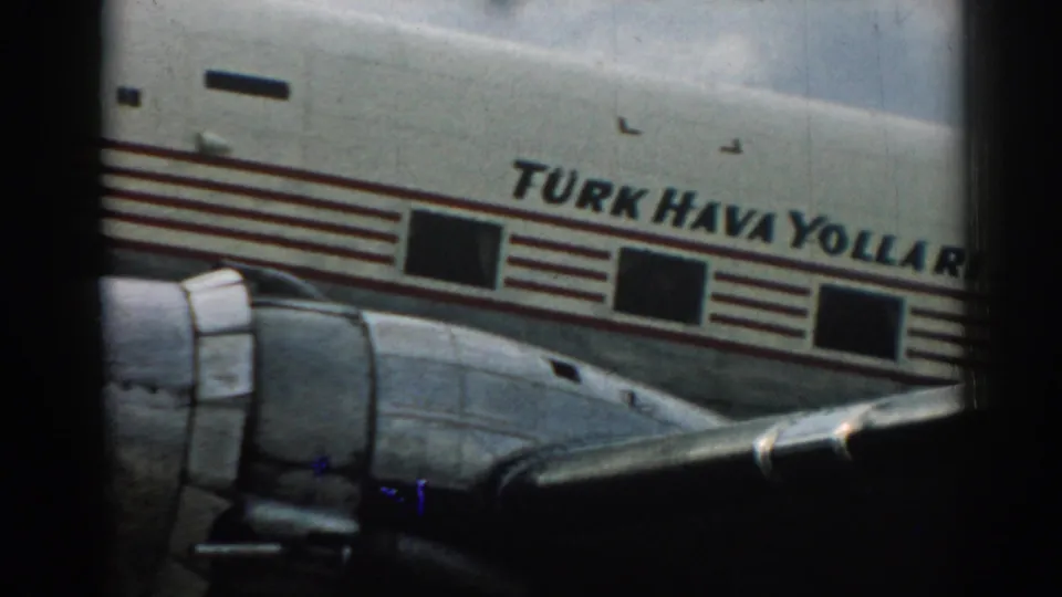 1962 Izmir frame showing the Turk Hava Yollari name on the fuselage, with the wing and engine filling the lower foreground.