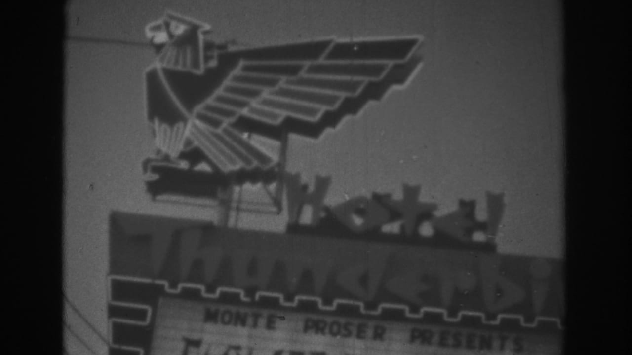 1962 Las Vegas frame with the eagle sign above a marquee where Monte Proser Presents is partly legible.