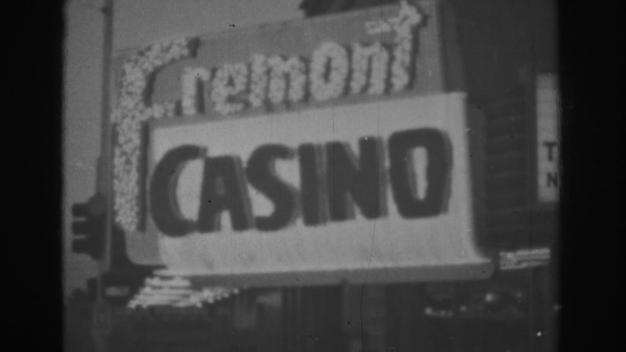 Fremont Casino marquee seen at night with bold lettering.