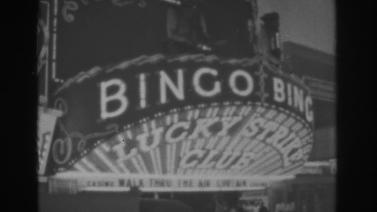 Lucky Strike Club bingo marquee seen in soft black-and-white film.