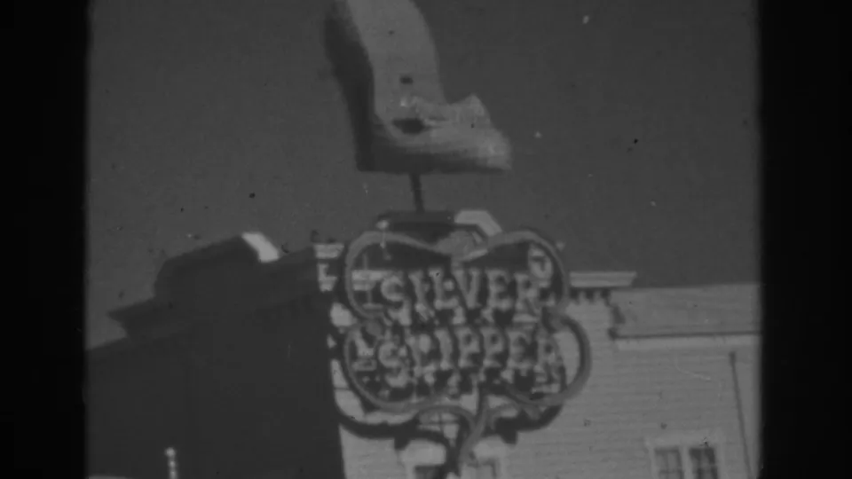 1962 Las Vegas footage frame with the shoe-shaped billboard positioned above the Silver Slipper sign.