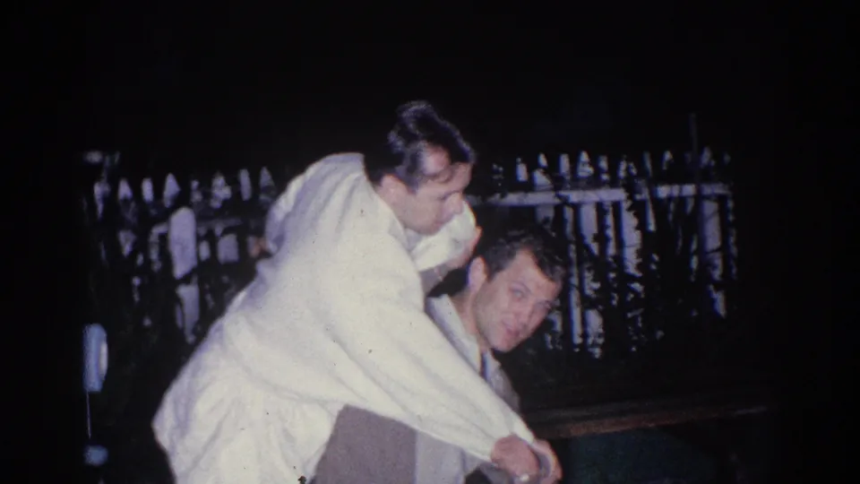 A playful moment shows one uniformed young man climbing onto another near a fence in the 1966 El Monte footage.