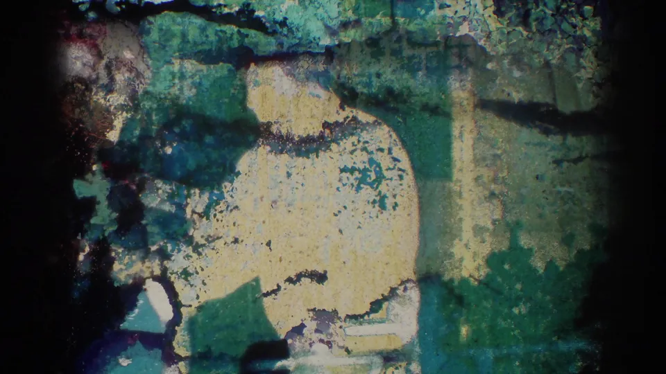 The final frame is heavily damaged, with color bleeds, scratches, and a faint view of the man and exterior wall still visible.