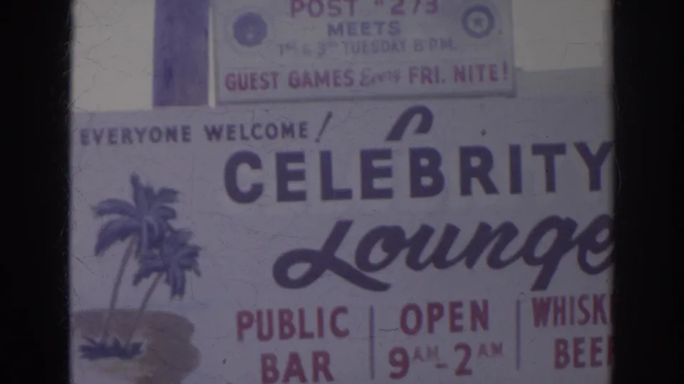 1966 Norfolk footage showing a close-up of the Celebrity Lounge sign with public bar wording, 9 AM to 2 AM hours, and palm-tree artwork.