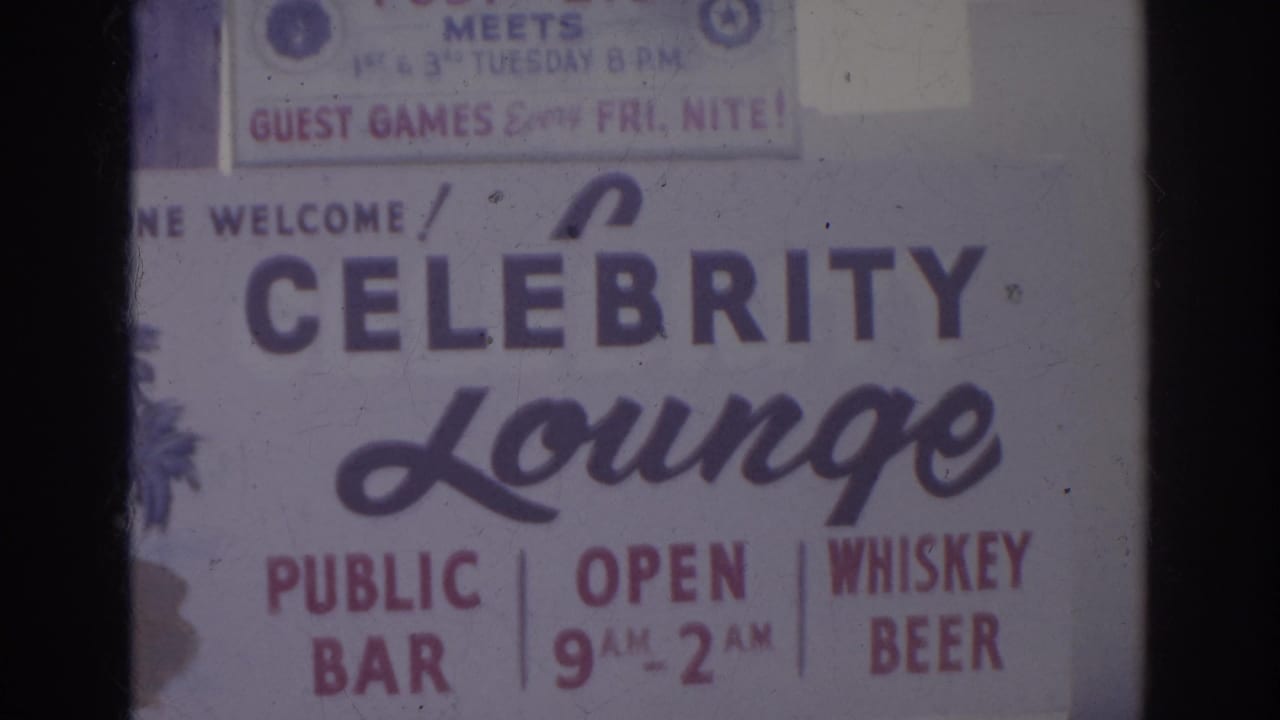 Celebrity Lounge sign section with public bar hours and whiskey beer lettering.