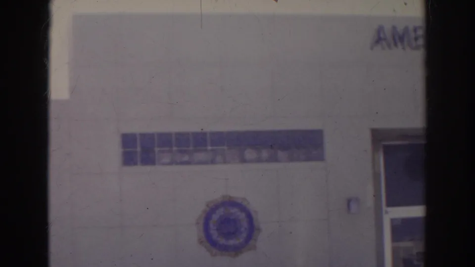 1966 Norfolk frame of the American Legion building exterior, with the emblem visible and partial signage near the top edge.