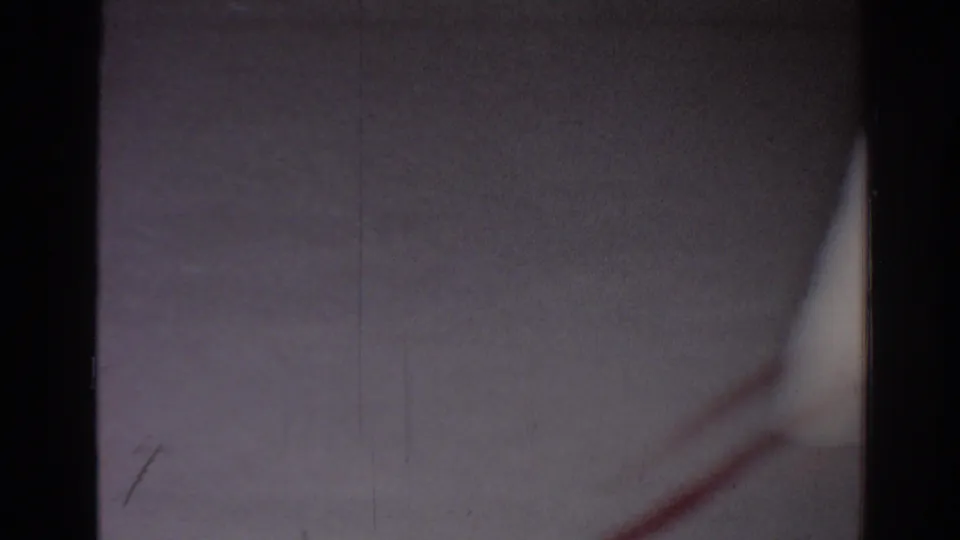 Soft 8mm frame of the gym mat area, with a red line and only partial blurred movement visible.