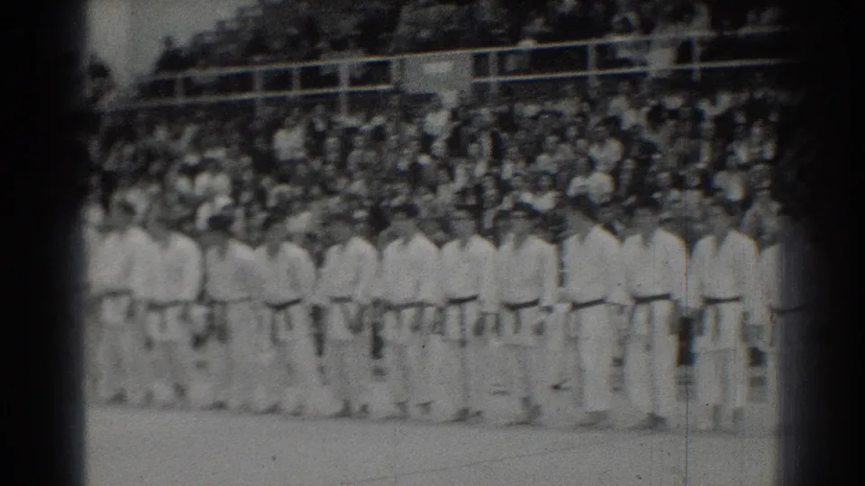 The final frame shows a longer view of the 1966 San Gabriel karate lineup, with competitors in gi standing before spectators.