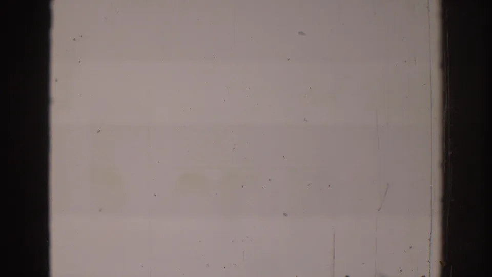 Temple City 1966 home-movie frame dominated by overexposure, a dark vertical edge, dust, and faint film wear.