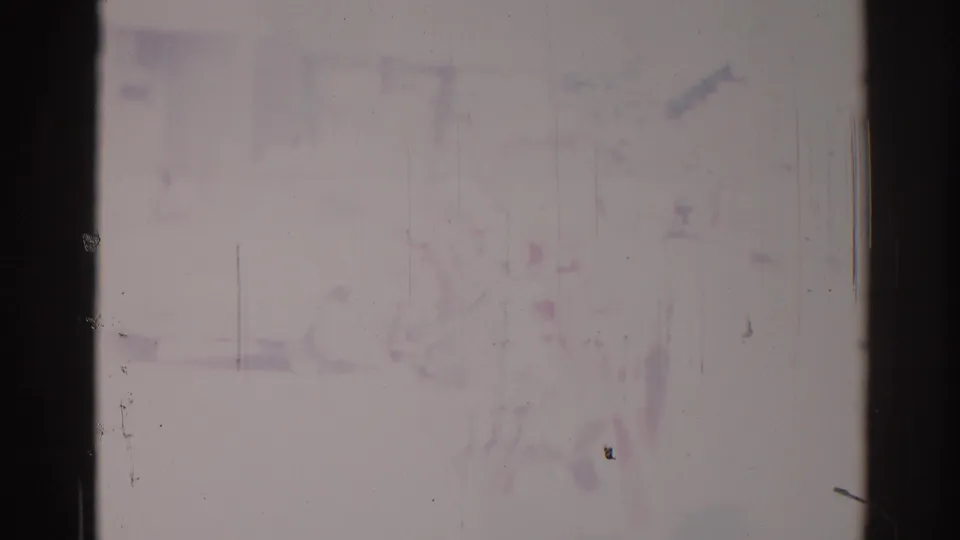 Faded 1967 Los Angeles home-movie frame with the rider and horse faintly visible against a bright urban street.