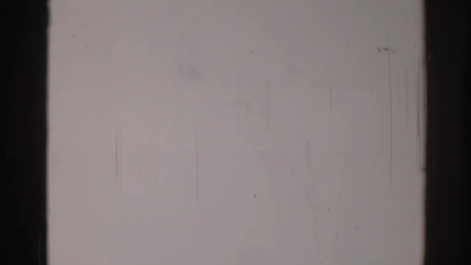 Los Angeles 1967 metadata frame showing a fog-like overexposed field with dark gate edges, surface scratches, dust, and grain.