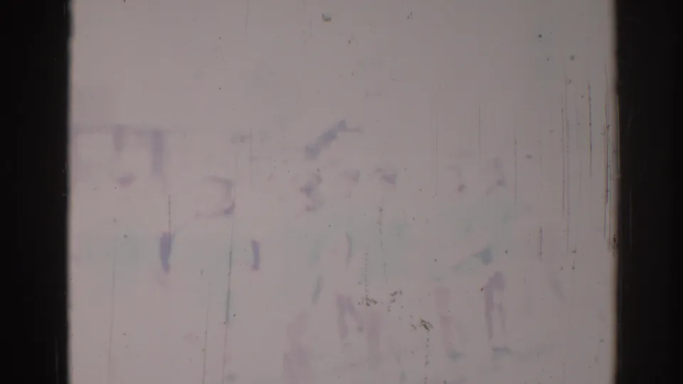 Faded 1967 Los Angeles home-movie frame with faint marching figures, bright washout, and visible vertical scratches on the film surface.