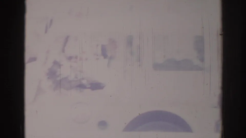 A partial white truck and dark wheel are visible near the lower frame in faded 1967 Los Angeles 8mm footage.