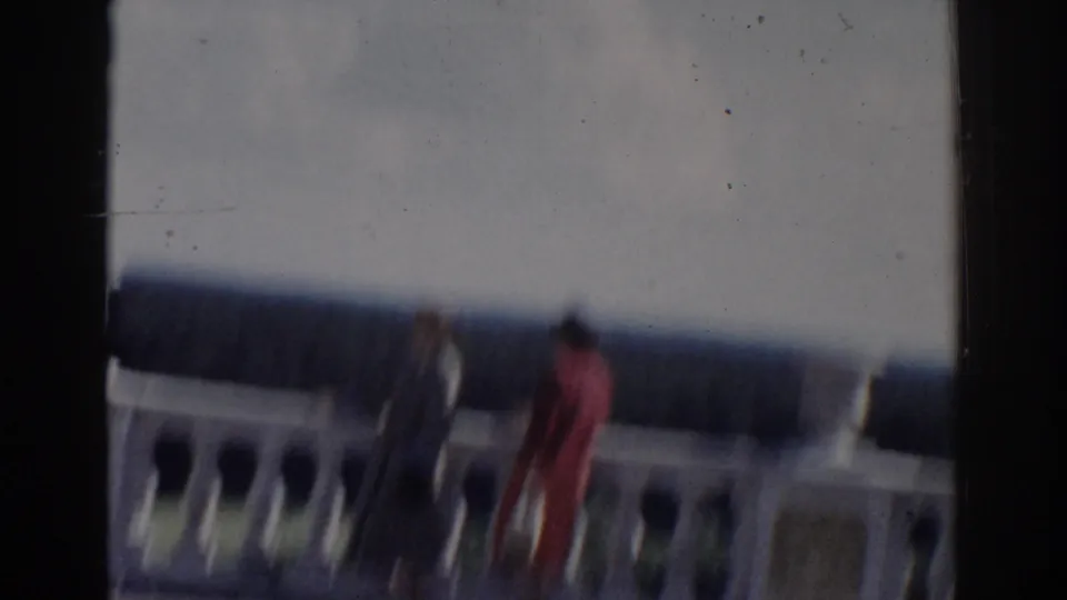 The final 1968 Moscow frame is blurred by motion or focus, showing two women near the ornate railing with sky and trees beyond.
