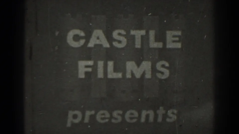 A dark title-card frame reads Castle Films presents, with soft focus, dust, and visible film wear.