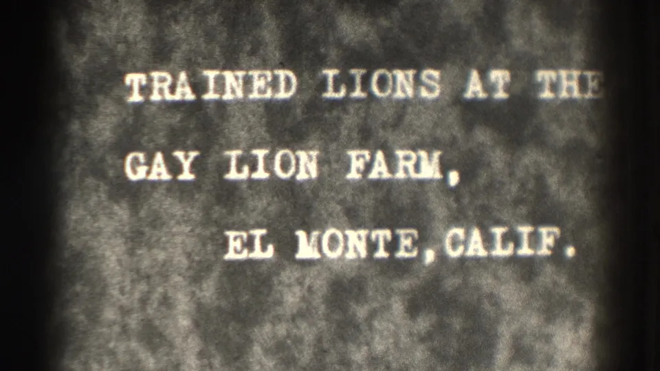 Later frame of the same 1937 title card with white lettering naming trained lions at Gay Lion Farm, El Monte, California.