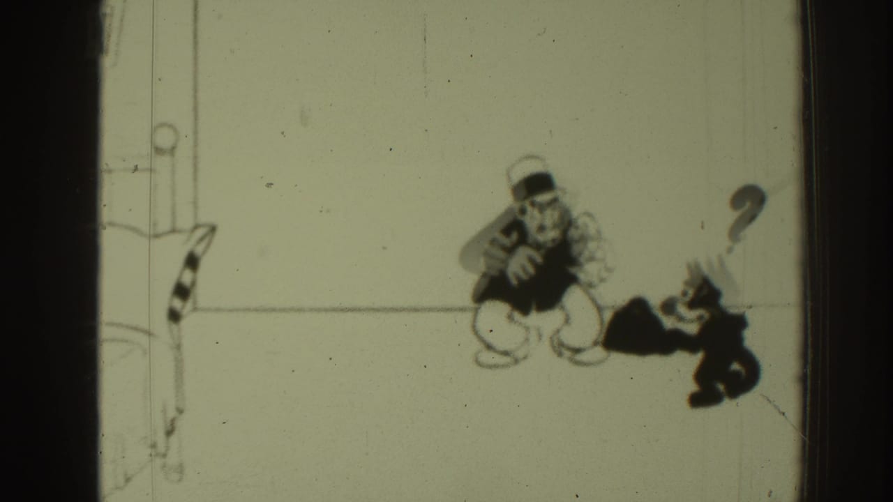 Cartoon man crouches beside a black cat with a question mark above it.