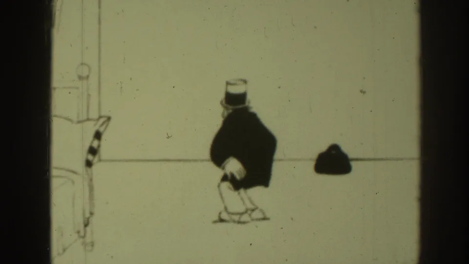 8mm frame from the 1937 Sacramento clip showing the cartoon man turned away from the viewer with a small dark object at right.