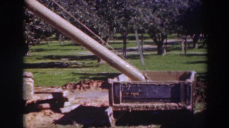 Final frame shows the chute over a wooden sidewalk form in the documented 1937 Sacramento outdoor construction scene.