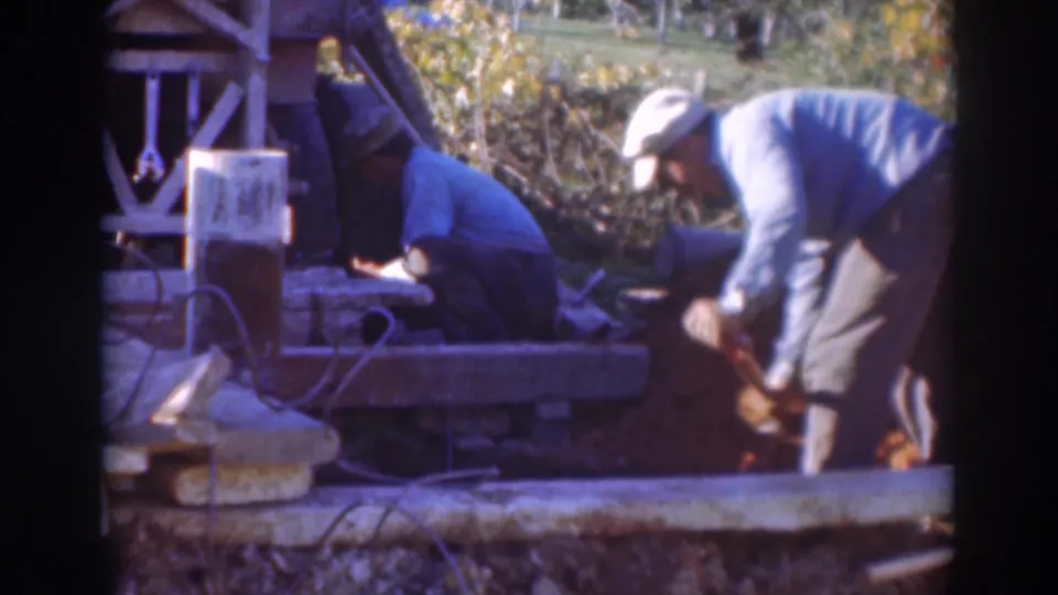 The final frame shows continued outdoor hand work in Sacramento, with one man bent over a tool and another seated nearby.