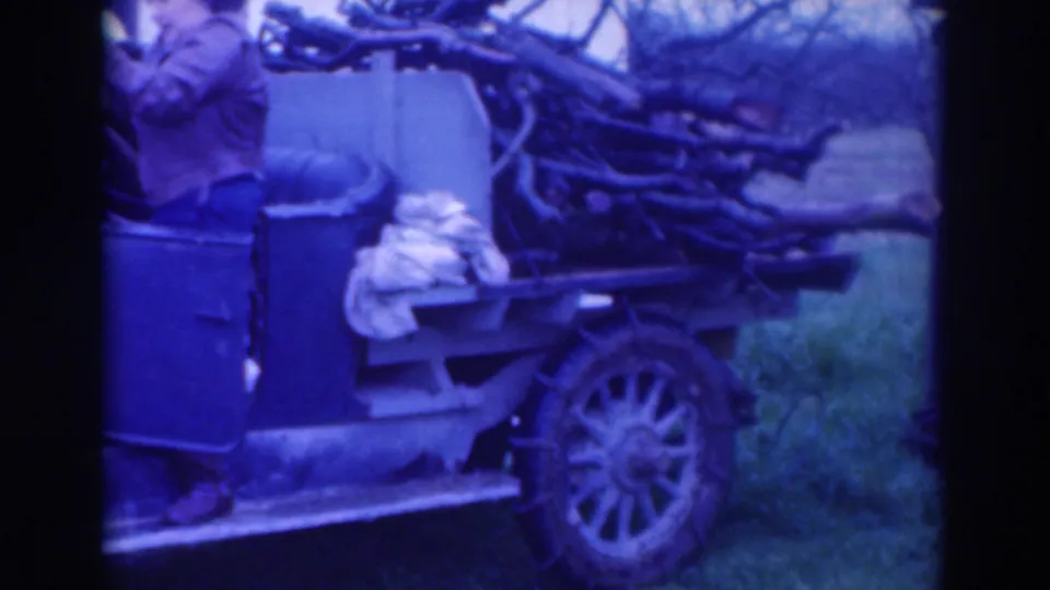 The final frame emphasizes the firewood-loaded rear of the open car, with one person partly visible at the edge of the 1937 Sacramento scene.
