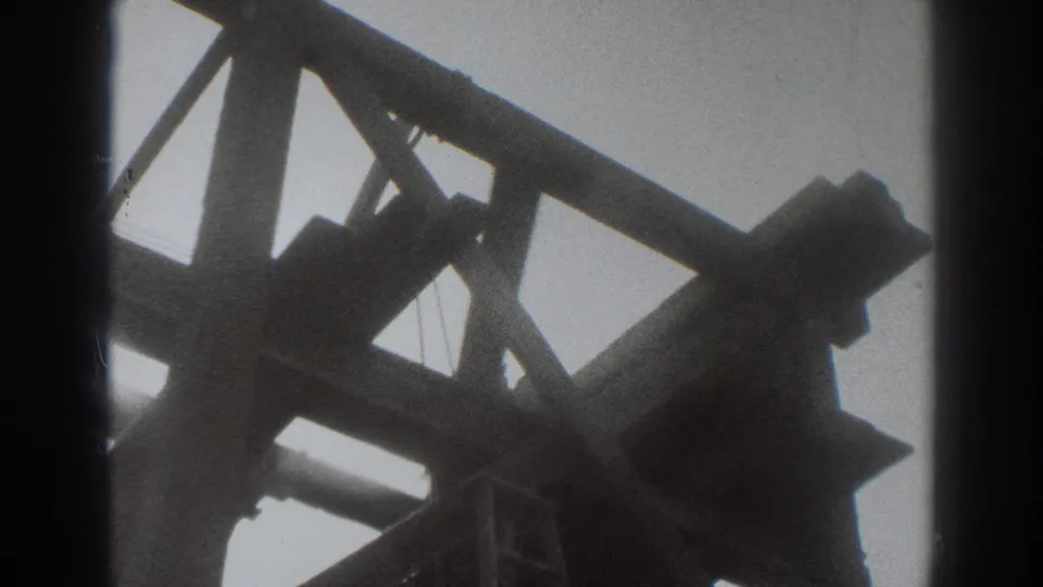1937 Sacramento house construction frame with dark beams, braces, and strong 8mm edge shadowing.