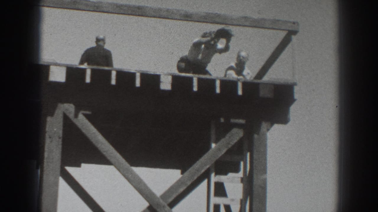 Three figures appear on the Sacramento platform, with one crouched and reaching or lifting an arm during the hat prank.