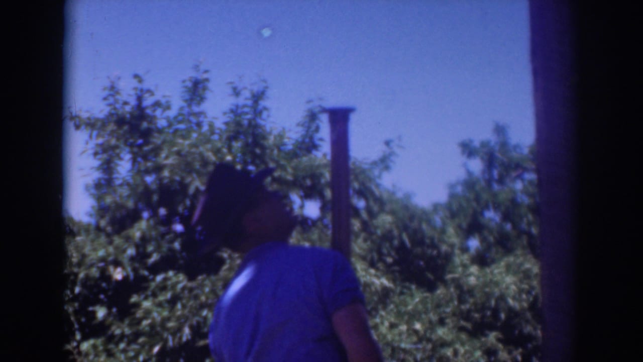 The final 1937 Sacramento frame shows a worker near the vertical pole or pipe, partly silhouetted against trees and sky.