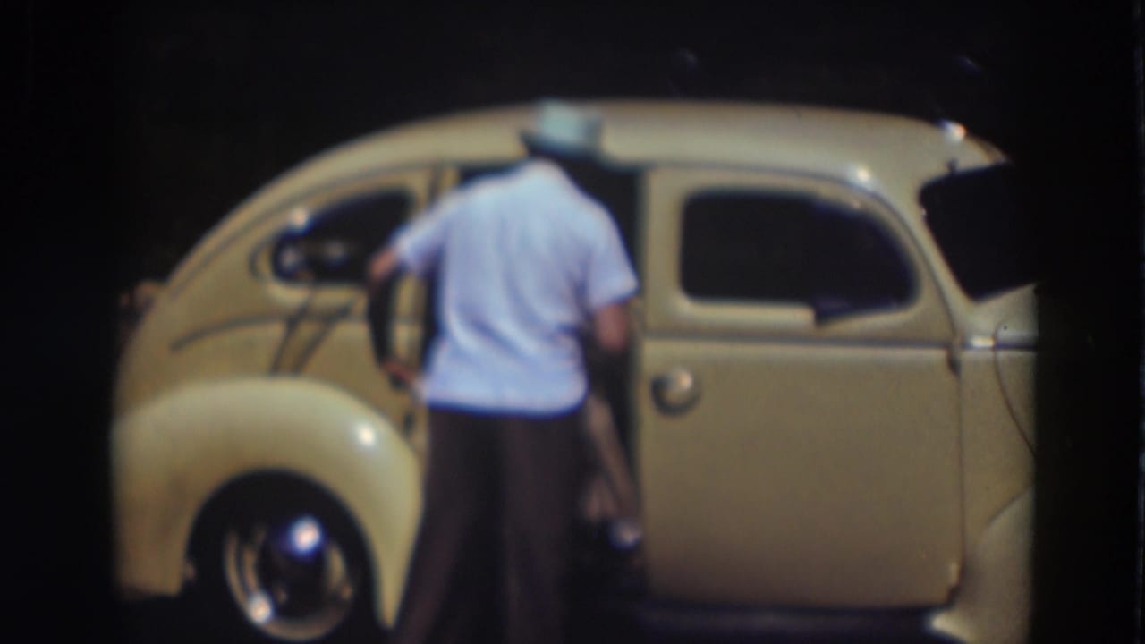 The final frame shows a man in a light shirt beside the cream-colored car after the passenger has moved inside.