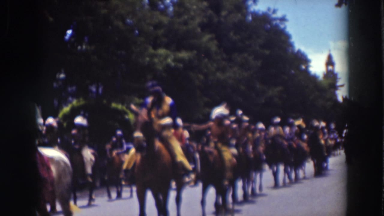A wider 1937 Truckee parade view shows a line of mounted riders and horses moving through a shaded, tree-lined street.