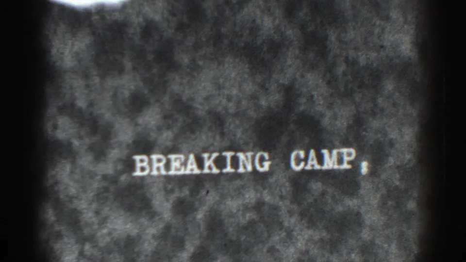 1938 8mm home-movie title card for Bucks Lake footage, reading "BREAKING CAMP" against a mottled film background.