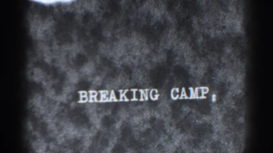 Grainy 8mm title card reading "BREAKING CAMP." with a period, part of the 1938 Bucks Lake home-movie sequence.