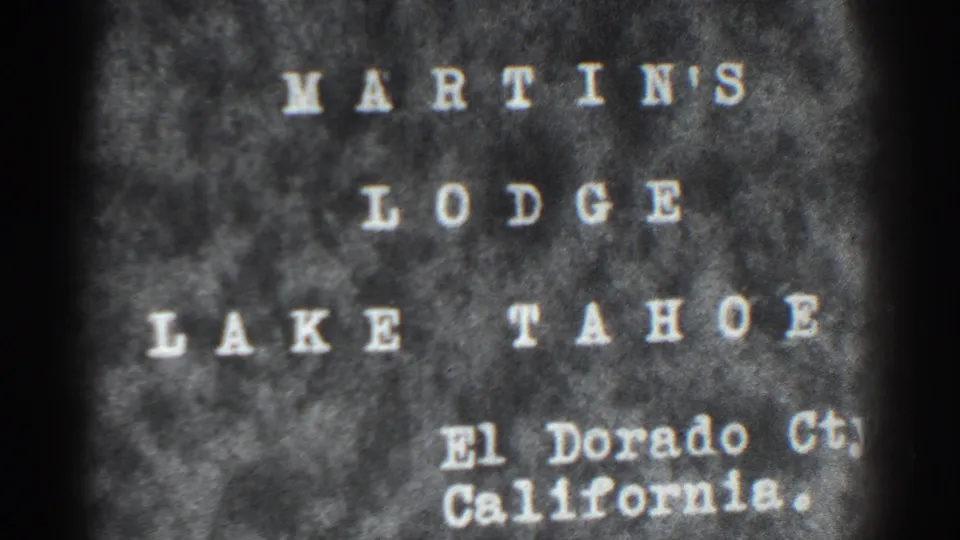 1938 8mm title card for Martin's Lodge at Lake Tahoe in El Dorado County, California, shown in grainy black-and-white film.