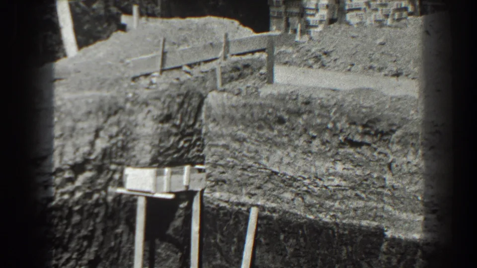 The Cumberland roadwork scene shows a plank barrier, eroded dirt bank, and partial construction equipment at the lower edge.
