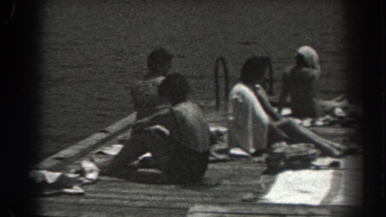 1938 New Jersey dock scene with seated sunbathers in swimwear, towels on the planks, water behind them, and a metal ladder at the edge.