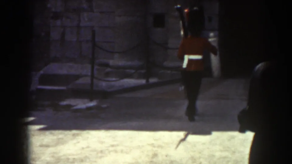 The ceremonial guard is seen from behind as he marches away in the 1938 Quebec home-movie footage.