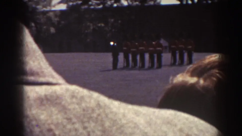 The final frame shows the 1938 Quebec guard formation from behind spectators, with a dark-clothed figure near the red-uniformed guards.