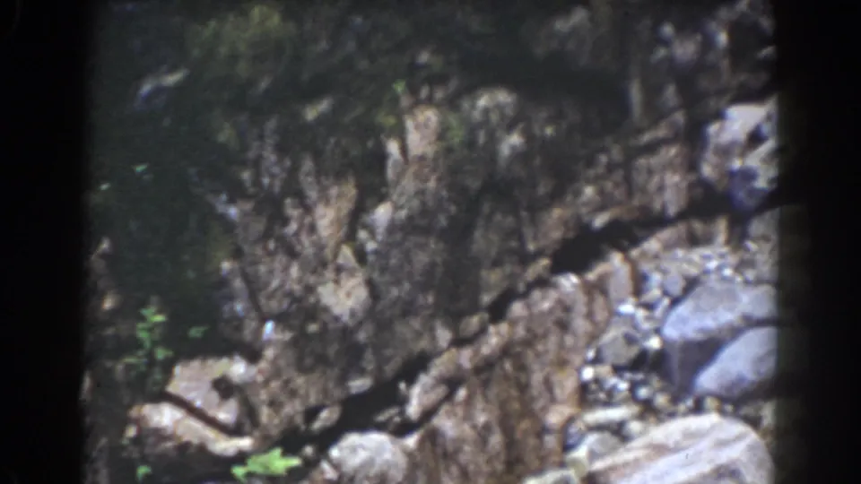Rock wall and scattered boulders in Mount Washington home-movie footage from the 1939 clip metadata.
