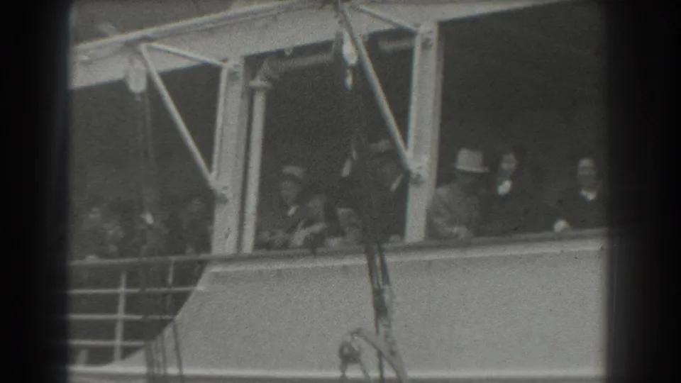 In the final frame, adults on a San Francisco ship deck wave from behind the railing as the vessel departs.